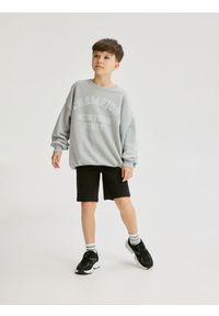 Reserved - Bawełniane szorty - czarny. Kolor: czarny. Materiał: bawełna. Wzór: gładki