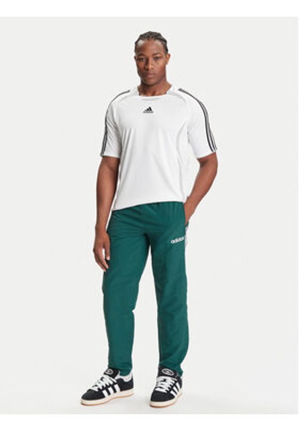 Adidas - adidas Spodnie dresowe JX3055 Zielony Regular Fit. Kolor: zielony. Materiał: syntetyk