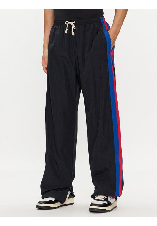 Champion Spodnie dresowe 220008 Czarny Custom Fit. Kolor: czarny. Materiał: syntetyk