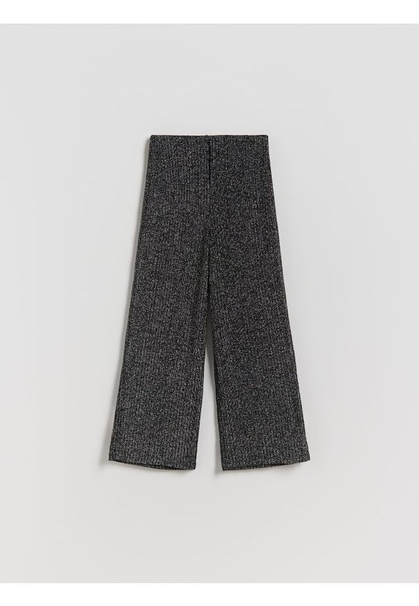 Reserved - Błyszczące spodnie - czarny. Kolor: czarny. Materiał: dzianina