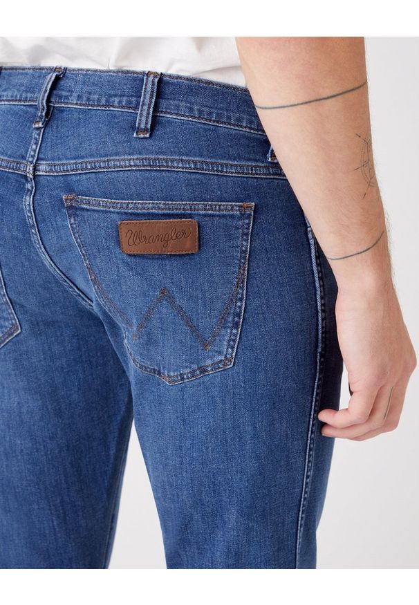Wrangler - WRANGLER LARSTON MĘSKIE SPODNIE JEANSOWE SPOTLITE W18SYJ38N 112145873
