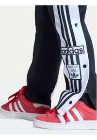 Adidas - adidas Spodnie dresowe Adibreak KD3989 Czarny Regular Fit. Kolor: czarny. Materiał: syntetyk #6