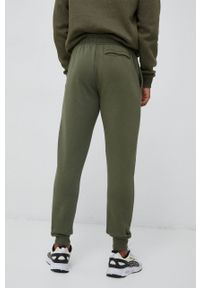 Under Armour spodnie dresowe kolor zielony gładkie. Kolor: zielony. Materiał: dresówka. Wzór: gładki #5