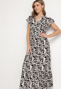 Born2be - Czarna Sukienka o Kopertowym Fasonie z Falbanką w Kwiatowy Wzór Flormoi. Okazja: na co dzień. Typ kołnierza: dekolt kopertowy, kołnierz z falbankami. Kolor: czarny. Materiał: materiał, jeans. Wzór: kwiaty. Sezon: wiosna, lato. Typ sukienki: kopertowe. Styl: klasyczny, casual #5