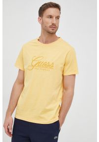 Guess t-shirt bawełniany kolor żółty z aplikacją. Kolor: żółty. Materiał: bawełna. Wzór: aplikacja