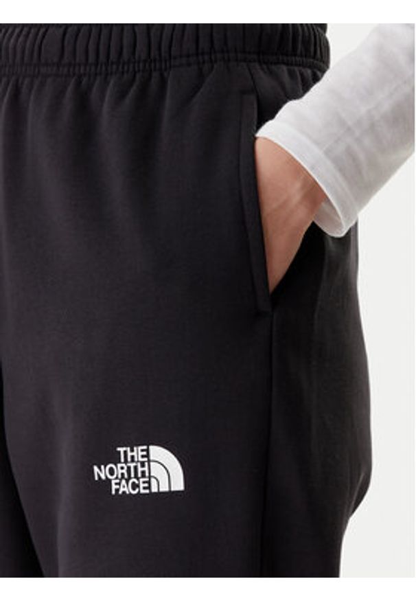 The North Face Spodnie dresowe Simple Dome NF0A8C1Y Czarny Regular Fit. Kolor: czarny. Materiał: bawełna