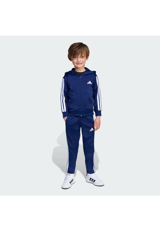 Adidas - Dziecięcy dres Essentials. Okazja: na uczelnię. Kolor: niebieski, wielokolorowy, biały. Materiał: dresówka. Styl: sportowy