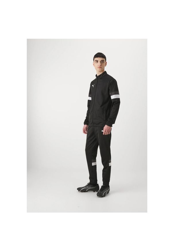 Dres treningowy męski Puma 65865303. Kolor: czarny, wielokolorowy, biały. Materiał: dresówka. Sport: piłka nożna