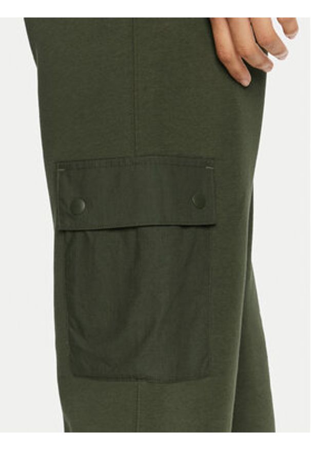 Champion Spodnie dresowe 117499 Khaki Regular Fit. Kolor: brązowy. Materiał: bawełna