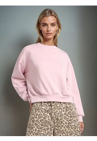 Sinsay - Gładka bluza z długim rękawem soft touch - różowy. Kolor: różowy. Długość rękawa: długi rękaw. Długość: długie. Wzór: gładki