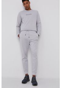 Calvin Klein Performance - Spodnie. Okazja: na co dzień. Kolor: szary. Wzór: nadruk. Styl: casual #1