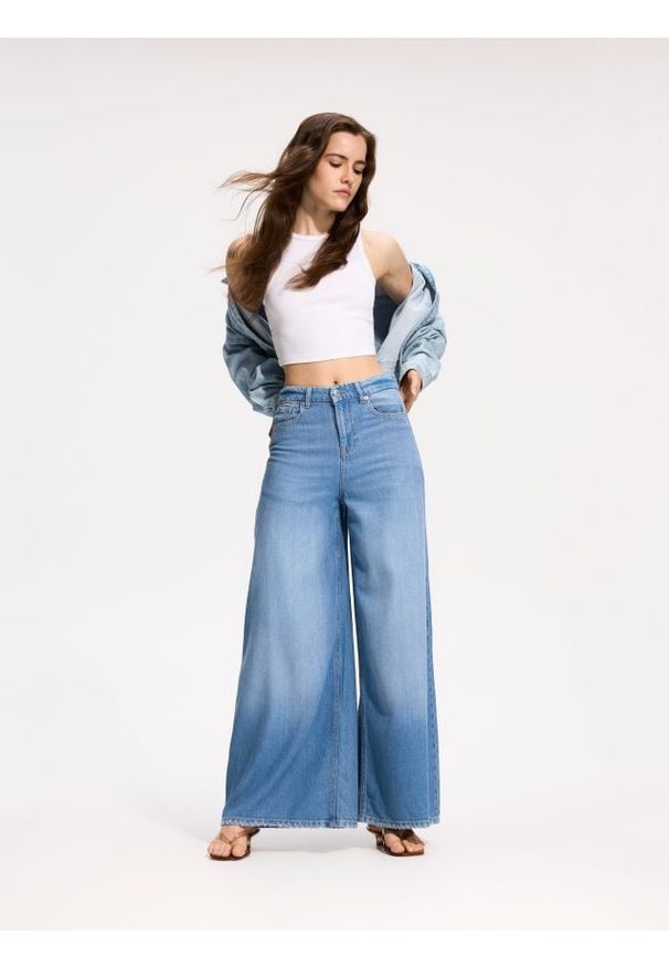 Reserved - Jeansy wide leg - niebieski. Kolor: niebieski