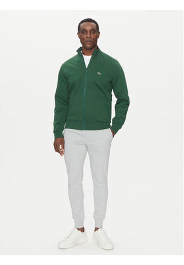 Lacoste Spodnie dresowe XH9624 Szary Regular Fit. Kolor: szary. Materiał: bawełna