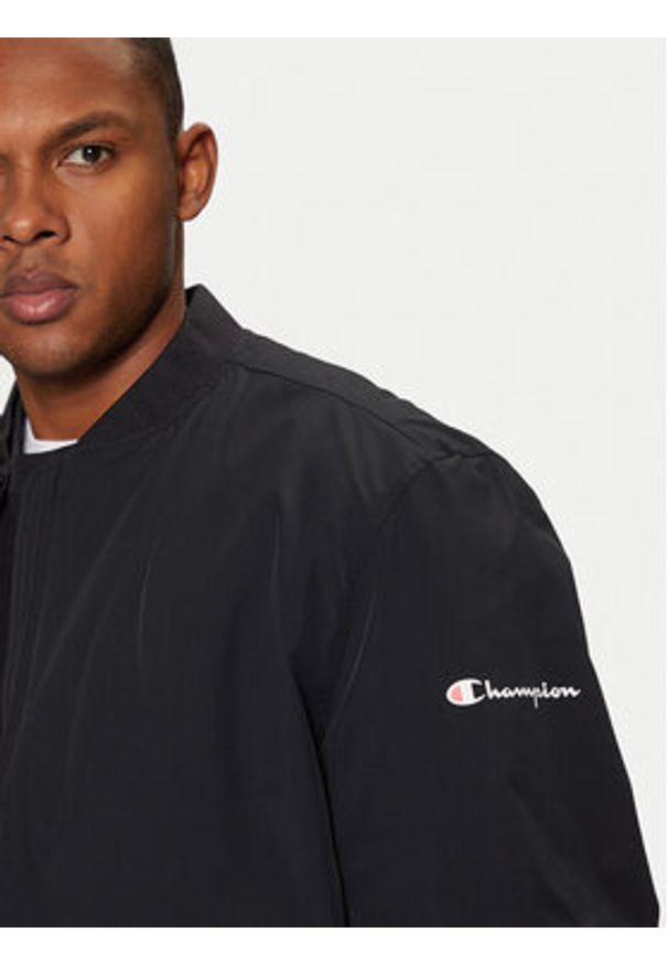 Champion Kurtka bomber 220344 Czarny Regular Fit. Kolor: czarny. Materiał: syntetyk