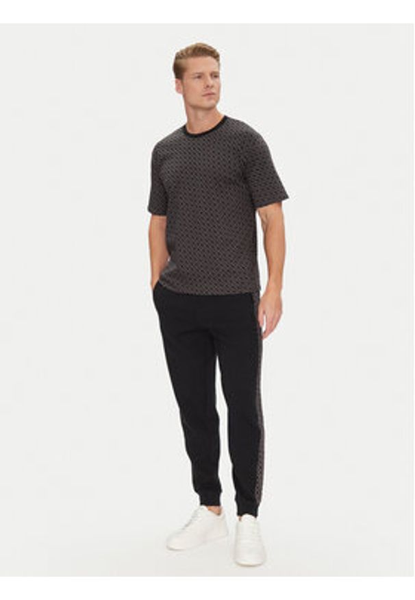 BOSS Spodnie dresowe Luke 50546839 Czarny Regular Fit. Kolor: czarny. Materiał: bawełna
