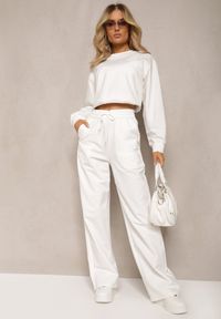 Renee - Białe Szerokie Spodnie Dresowe z Elastycznej Bawełny Niarti. Kolor: biały. Materiał: bawełna, dresówka #1