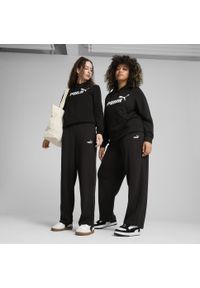 Puma - Damskie spodnie z prostymi nogawkami i małym logo No. 1 ESS Comfort PUMA Black. Kolor: czarny, wielokolorowy. Wzór: haft. Sport: turystyka piesza