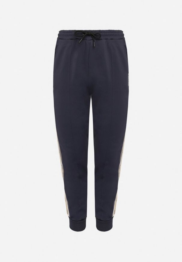 Born2be - Granatowe Spodnie Dresowe ze Ściągaczem Zdobione Lampasem z Polarową Podszewką Edittia. Okazja: na co dzień. Kolor: niebieski. Materiał: dresówka, polar. Wzór: aplikacja. Styl: klasyczny, casual, elegancki