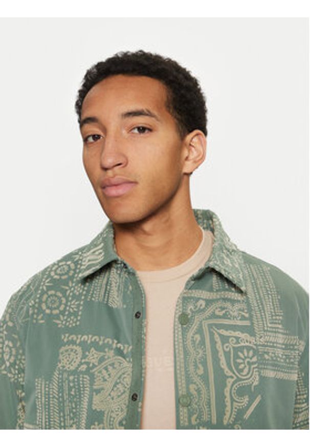 Guess Kurtka przejściowa M5RL11 WGUG0 Kolorowy Regular Fit. Materiał: syntetyk. Wzór: kolorowy