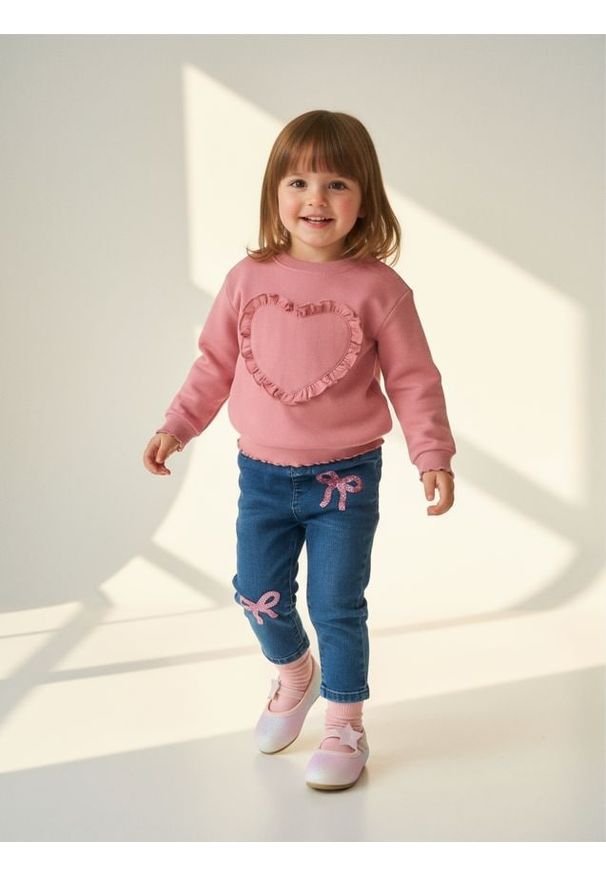 Sinsay - Jeansy pull on z ozdobnymi cekinami - niebieski. Kolor: niebieski. Materiał: jeans