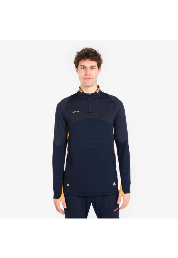 KIPSTA - Bluza piłkarska Kipsta CLR na krótki suwak. Kolor: niebieski, wielokolorowy, pomarańczowy. Materiał: skóra, materiał. Długość: krótkie. Sport: piłka nożna