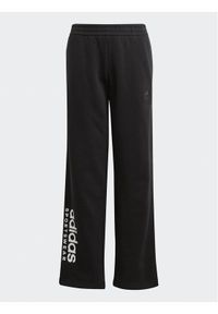 Adidas - adidas Spodnie dresowe Fleece Kids IL4937 Czarny Loose Fit. Kolor: czarny. Materiał: bawełna
