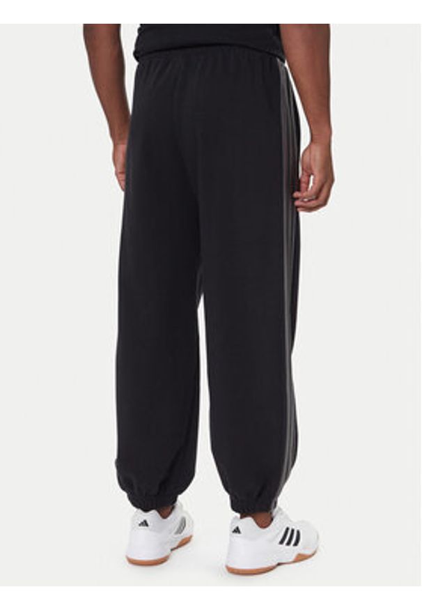 Adidas - adidas Spodnie dresowe Ess JM1703 Czarny Regular Fit. Kolor: czarny. Materiał: bawełna
