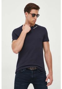 TOMMY HILFIGER - Tommy Hilfiger t-shirt bawełniany kolor granatowy z aplikacją. Kolor: niebieski. Materiał: bawełna. Długość rękawa: krótki rękaw. Długość: krótkie. Wzór: aplikacja. Styl: klasyczny #1