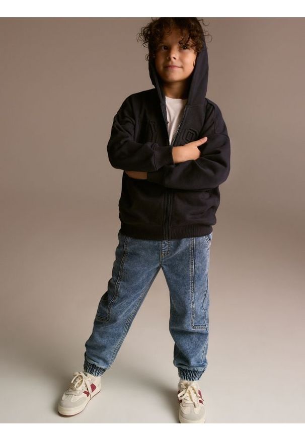 Reserved - Elastyczne jeansy jogger - niebieski. Kolor: niebieski