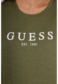 Guess - GUESS Oliwkowy t-shirt damski z białym logo. Kolor: zielony. Materiał: bawełna. Długość rękawa: krótki rękaw #4