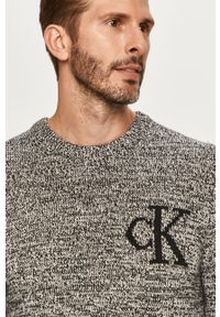 Calvin Klein Jeans - Sweter. Okazja: na co dzień. Kolor: czarny. Materiał: wełna, bawełna, dzianina, poliamid. Długość rękawa: długi rękaw. Długość: długie. Wzór: aplikacja. Styl: casual #2