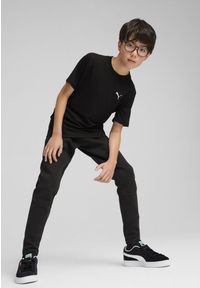 Puma - Młodzieżowe spodnie Evostripe PUMA Black. Kolor: czarny