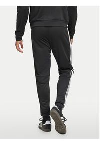 Adidas - adidas Spodnie dresowe Tiro 25 Essentials Sweat JC5464 Czarny Regular Fit. Kolor: czarny. Materiał: syntetyk #3