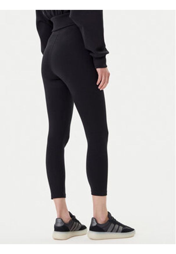 Nike Legginsy DV7789 Czarny Regular Fit. Kolor: czarny. Materiał: bawełna