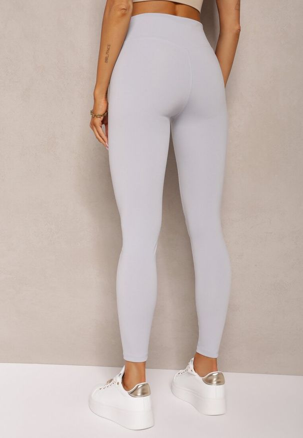 Renee - Jasnoniebieskie Sportowe Legginsy High Waist Quarefia. Stan: podwyższony. Kolor: niebieski. Materiał: materiał. Długość: długie. Styl: sportowy