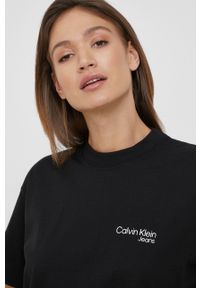Calvin Klein Jeans t-shirt bawełniany kolor czarny. Kolor: czarny. Materiał: bawełna. Długość rękawa: krótki rękaw. Długość: krótkie. Wzór: nadruk