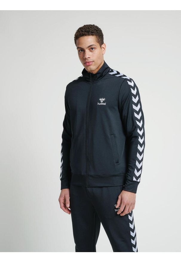 Kurtka Hummel Nathan 2.0 zip. Kolor: biały, wielokolorowy, czarny. Materiał: polar