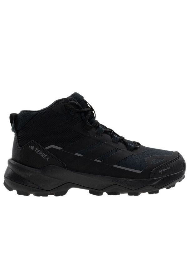 Adidas - Buty męskie adidas Terrex Skychaser AX5 Mid GTX JQ2207 - czarne. Zapięcie: pasek. Kolor: czarny. Materiał: materiał, syntetyk, guma. Szerokość cholewki: normalna. Technologia: Gore-Tex. Wzór: paski, aplikacja. Model: Adidas Terrex. Sport: turystyka piesza