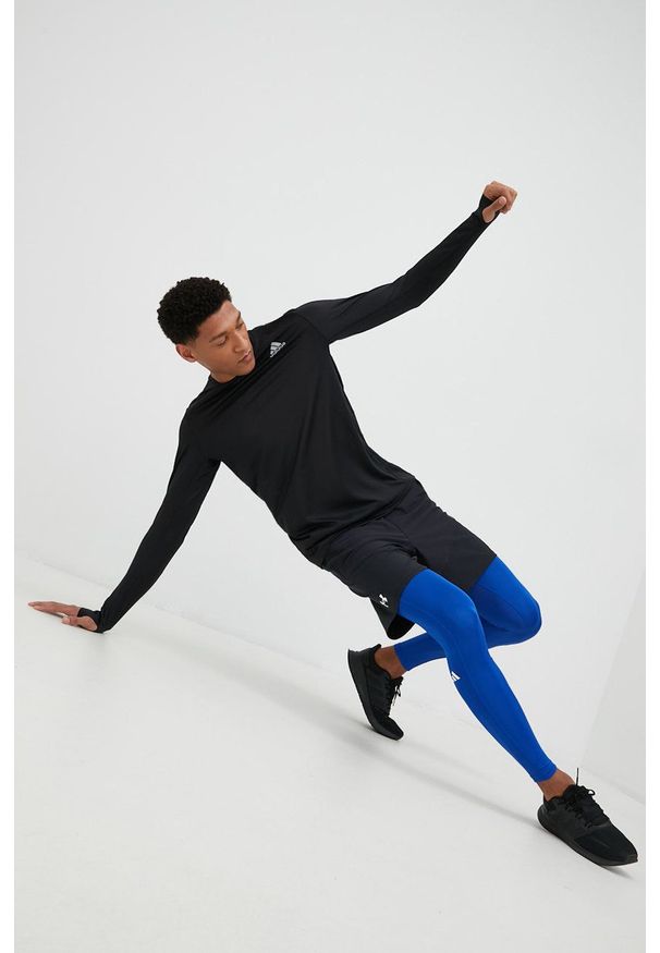 adidas Performance legginsy treningowe męskie gładkie. Kolor: niebieski. Materiał: skóra, materiał. Technologia: Techfit (Adidas). Wzór: gładki. Sport: fitness