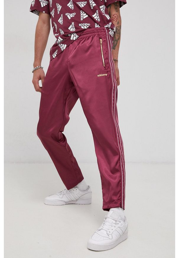 adidas Originals Spodnie męskie kolor fioletowy. Kolor: fioletowy. Materiał: tkanina