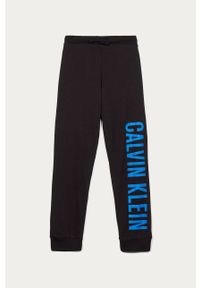 Calvin Klein Underwear - Spodnie dziecięce 128-176 cm. Okazja: na co dzień. Kolor: czarny. Materiał: bawełna, materiał, dzianina. Wzór: nadruk. Styl: casual #1
