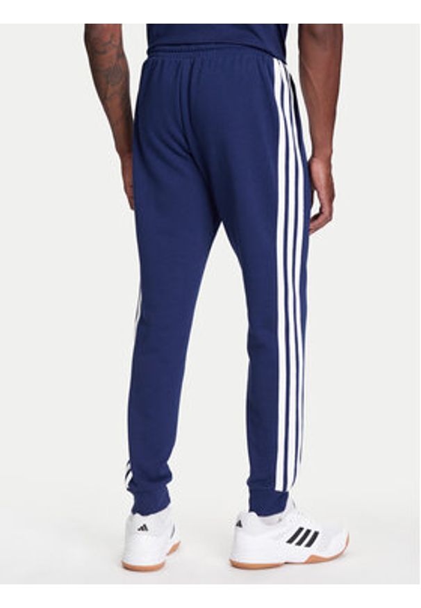 Adidas - adidas Spodnie dresowe Essential 3-Stripes JD1878 Niebieski Regular Fit. Kolor: niebieski. Materiał: bawełna