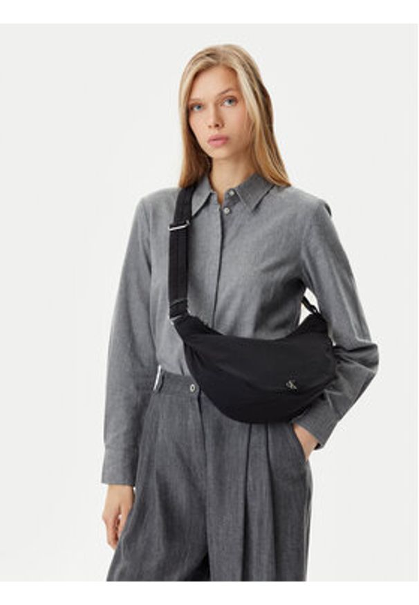 Calvin Klein Jeans Torebka Luna Nylon Sling Bag LV04K3095G Czarny. Kolor: czarny