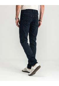 Wrangler - WRANGLER MĘSKIE SPODNIE JEANSOWE WRANGLER LARSTON CLOUDY SKIES 112350840. Okazja: na co dzień. Stan: obniżony. Długość: długie. Styl: młodzieżowy, casual, klasyczny #4