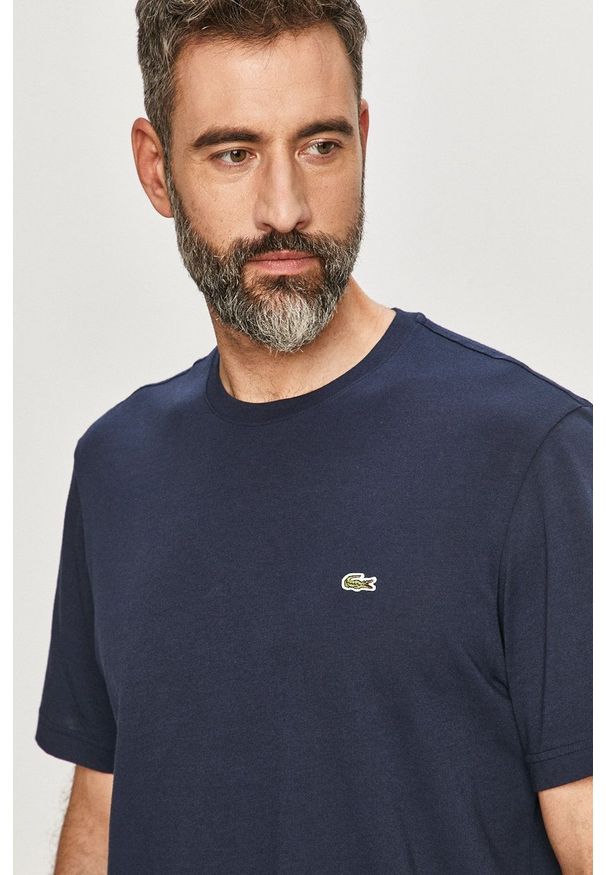 Lacoste - T-shirt/polo TH2038. Okazja: na co dzień. Typ kołnierza: polo. Kolor: niebieski. Materiał: dzianina. Wzór: gładki, aplikacja. Styl: casual