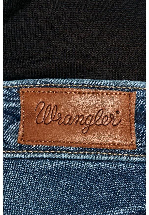 Wrangler - Jeansy 615. Kolor: niebieski