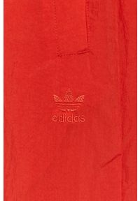 adidas Originals - Spodnie. Kolor: czerwony. Materiał: materiał