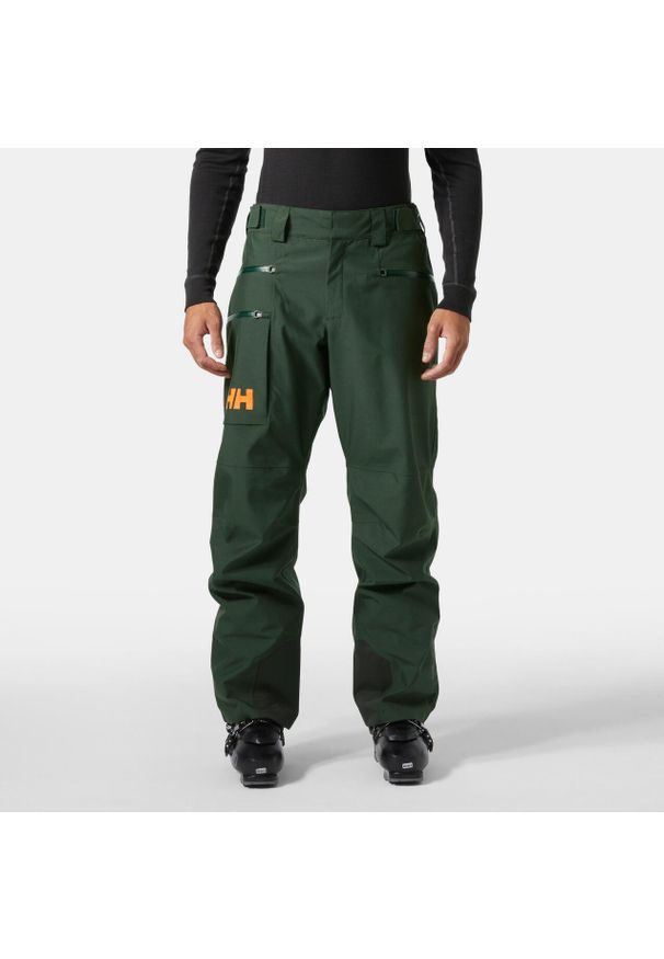 Spodnie narciarskie Helly Hansen Garibaldi 2.0. Kolor: zielony, czarny, wielokolorowy. Sezon: zima. Sport: narciarstwo