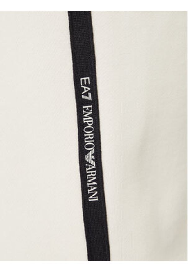 EA7 Emporio Armani Spodnie dresowe 7M000974 AF10377 U1105 Beżowy Regular Fit. Kolor: beżowy. Materiał: bawełna