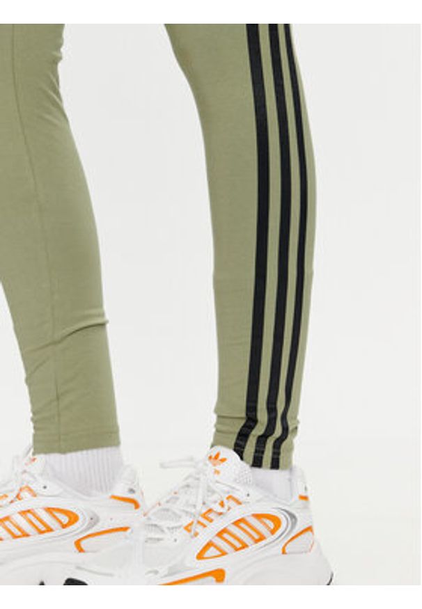 Adidas - adidas Legginsy Future Icons 3-Stripes IW5291 Zielony Slim Fit. Kolor: zielony. Materiał: bawełna